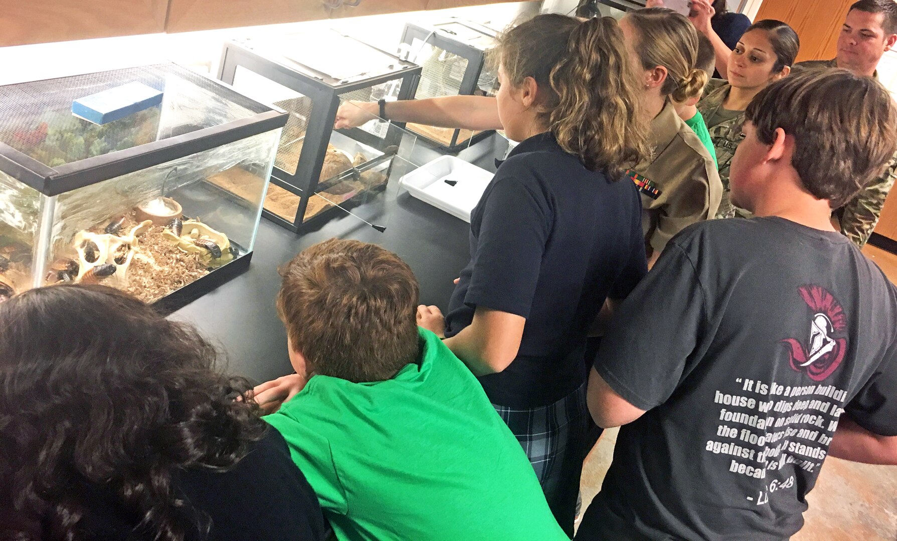 Sixth-grade students from the River City Believers Academy observe the live animal exhibit in the Preventive Medicine Specialist Program entomology lab at the Medical Education and Training Campus at Joint Base San Antonio-Fort Sam Houston.