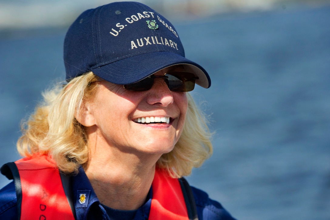 Coast Guard auxiliary member Dorothy Neiman, assigned to Flotilla 23-03 from Annapolis, Md., is part of an auxiliary crew maintaining a safety zone for an air show during Maryland Fleet Week in Baltimore, Oct. 16, 2016. Coast Guard photo by Petty Officer 2nd Class Lisa Ferdinando