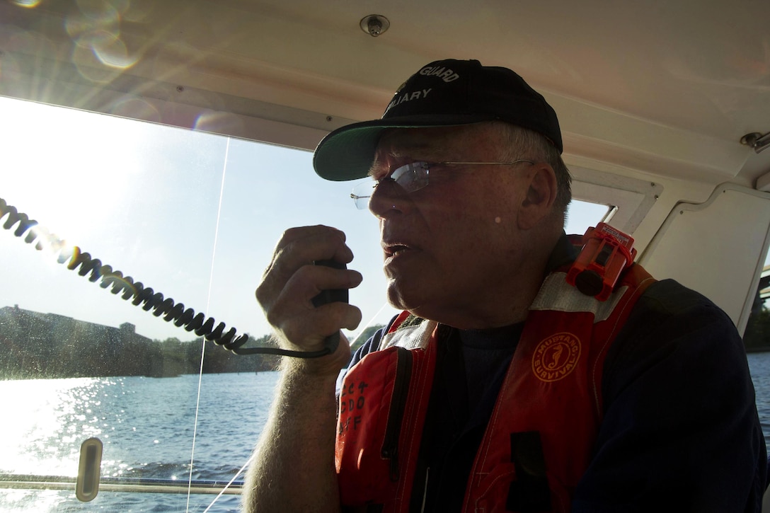Coast Guard auxiliary member Don Parker, assigned to Flotilla 23-03 from Annapolis, Md., concludes a day-long patrol in which he and his crew maintained a safety zone during an air show during Maryland Fleet Week in Baltimore, Oct. 16, 2016. Coast Guard photo by Petty Officer 2nd Class Lisa Ferdinando