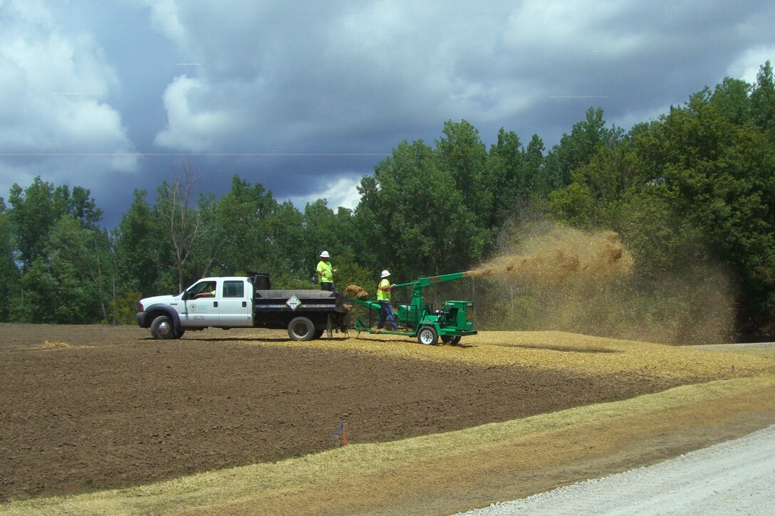 Contractors seed the soil cover at the former Lockbourne landfill, Columbus, Ohio, in August 2016.