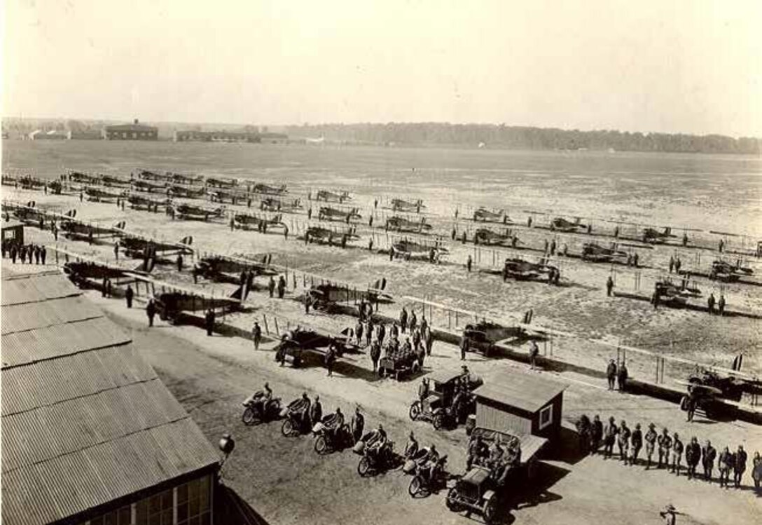 Personnel and aircraft of the School of Aerial Photographic Reconnaissance stand in review at Langley, 1918