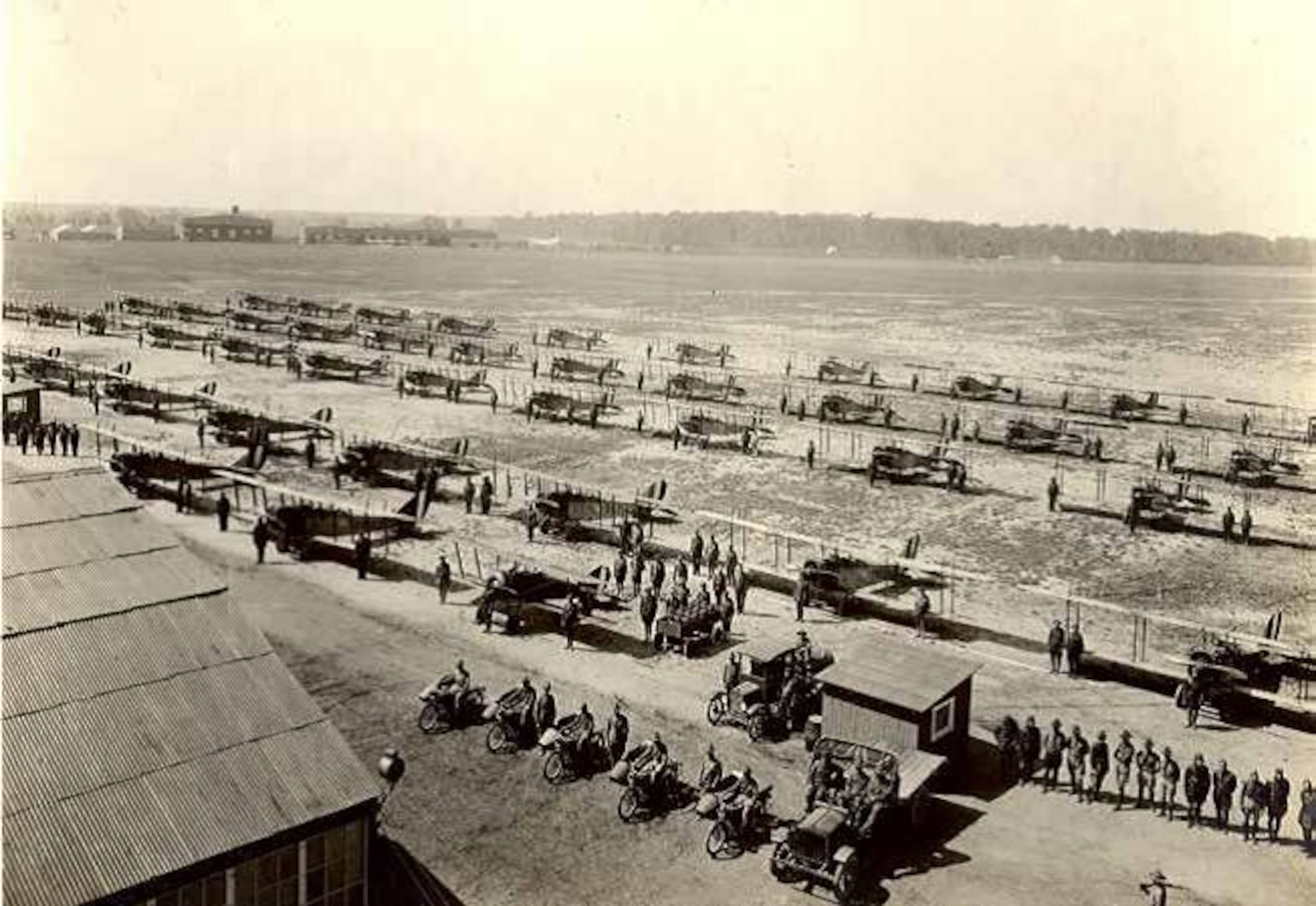 Personnel and aircraft of the School of Aerial Photographic Reconnaissance stand in review at Langley, 1918