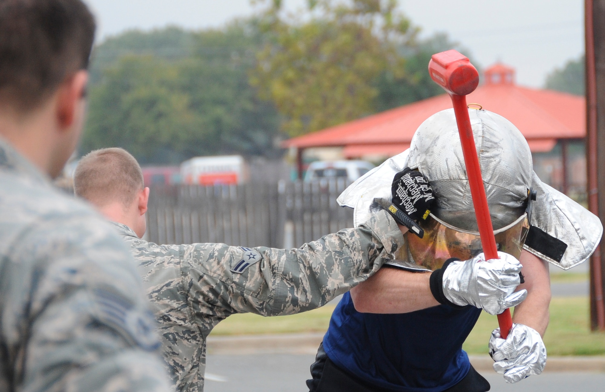 An Airman participates in the Keiser Sled challenge during the fire muster competition at Barksdale Air Force Base, La., Oct. 13, 2016. The obstacles allowed competitors to experience different tasks and techniques firefighters require to perform their job safely and successfully. (U.S. Air Force photo/Airman Alexis C. Schultz)