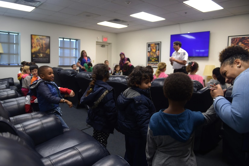 Students from Samuel P. Langley Elementary School, Hampton Va., listen to fire department personnel teach them about fire safety, at Joint Base Langley-Eustis, Va., Oct. 12, 2016. The theme for this year’s Fire Prevention Week, is “Don’t Wait, Check the Date”, stressing the importance of maintaining efficient smoke detectors inside homes. (U.S. Air Force photo by Senior Airman Kimberly Nagle)