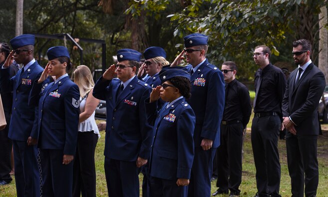 Friends from Elmendorf Air Force Base, Alaska and Whiteman Air Force Base, Mo., render salutes during a funeral, Oct. 17, 2016, in Sparr, Fla.  The funeral was in honor of Staff Sgt. Darryl Smith, who was a laboratory technician stationed at Elmendorf AFB from 2012-2015 and finished his career at Whiteman AFB. (U.S. Air Force photo by Airman 1st Class Greg Nash)