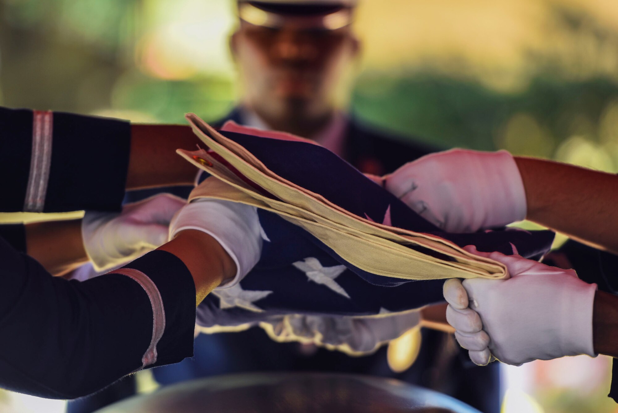 Members of the Moody Air Force Base Honor Guard fold a flag during a funeral in remembrance of Staff Sgt. Darryl Smith, 509th Medical Support Squadron laboratory technician, Whiteman AFB, Mo., Oct. 17, 2016, in Sparr, Fla. Moody’s honor guard performs congressionally mandated honors throughout 51 counties within Southern Georgia and Northern Florida. (U.S. Air Force photo by Airman 1st Class Greg Nash
