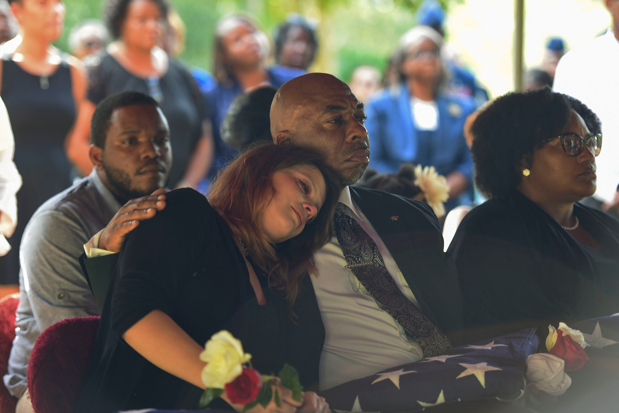 Darryl Smith Sr., consoles his daughter-in-law, Albessa Smith, during his son’s, Staff Sgt. Darryl Smith, 509th Medical Support Squadron laboratory technician, Whiteman Air Force Base, Mo., funeral, Oct. 17, 2016, in Sparr, Fla. Smith was the middle child of five. (U.S. Air Force photo by Airman 1st Class Greg Nash)