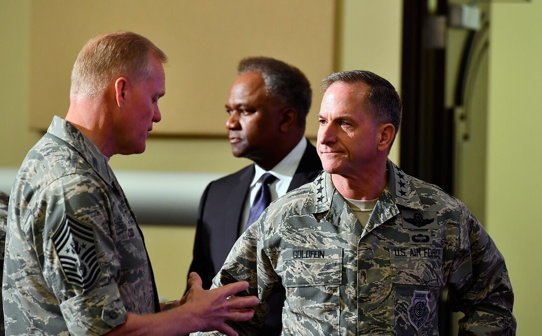Air Force Chief of Staff Gen. David L. Goldfein speaks with Chief Master Sgt. of the Air Force James A. Cody during the Secretary of the Air Force Spouse and Family Forum at Joint Base Andrews, Md., Oct. 19, 2016. (U.S. Air Force photo/Scott M. Ash)