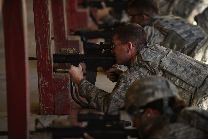 SSgt Corey McKeel, 2nd Security Forces Squadron installation patrolman, aims at a target during his M4 carbine qualification at Barksdale Air Force Base, La., Oct. 17, 2016. The M4 uses 5.56x45 mm ammunition and has an effective point target range of 500 meters and an effective area target range of 600 meters. (U.S. Air Force photo/Airman 1st Class Stuart Bright)