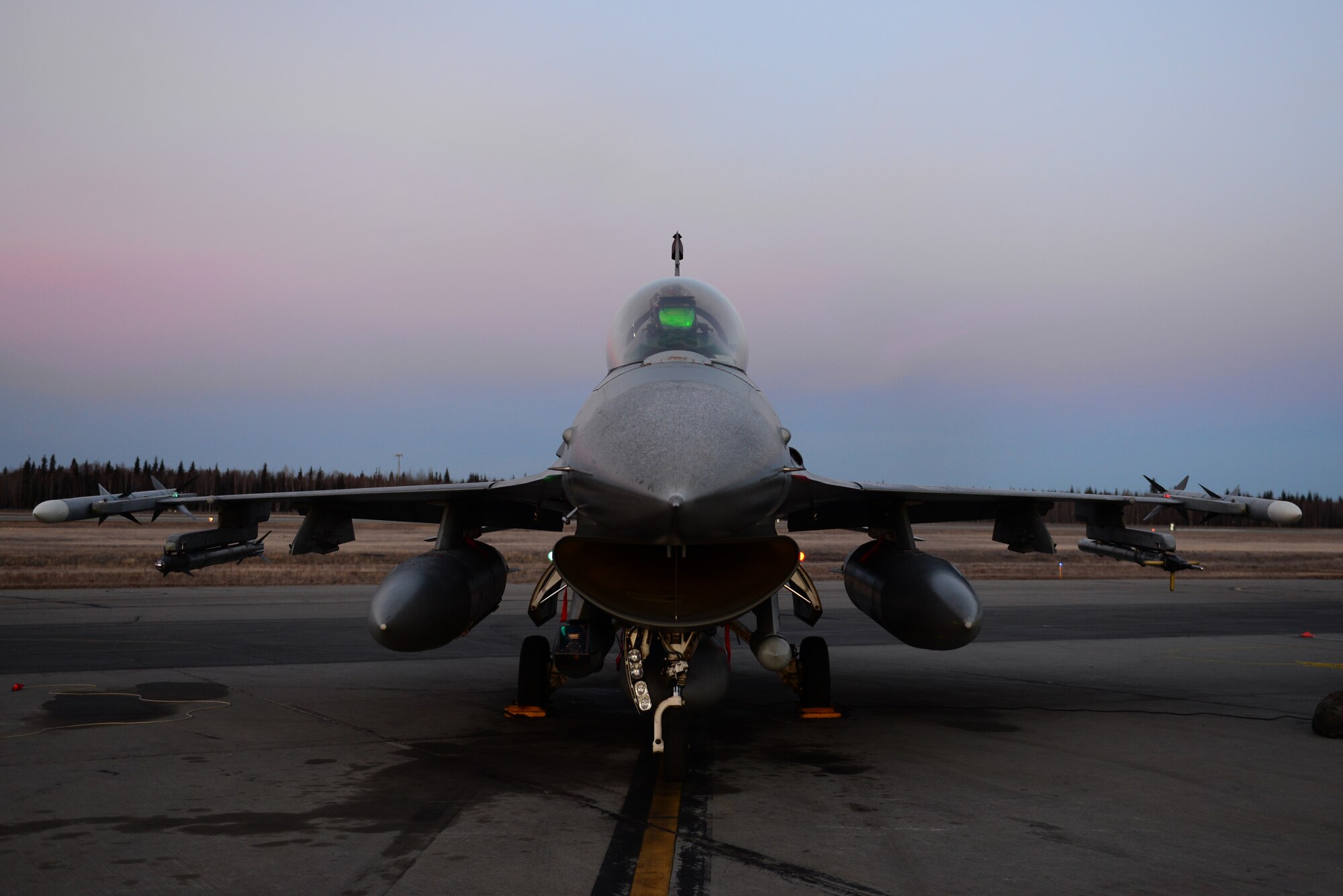 U.S. Air Force Capt. Michael O’Donnell, a pilot assigned to the 36th Fighter Squadron, Osan Air Base, Republic of Korea, closes the hatch of an F-16 Fighting Falcon aircraft while preparing for a morning sortie Oct. 19, 2016, during RED FLAG-Alaska (RF-A) 17-1, at Eielson Air Force Base, Alaska. RF-A exercises are vital to maintaining peace and stability in the Pacific region. (U.S. Air Force photo by Airman 1st Class Cassandra Whitman)