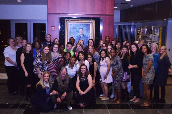 Schriever Child Development Center and School Age Care program staff gather following a recognition dinner in their honor at Schriever Air Force Base, Colorado, Friday, Oct. 14, 2016. The Parents Advisory Board sponsored the dinner to both recognize the hard work the staff put in during their National Association for the Education of Young Children accreditation period and as a way to show appreciation for the work they do on a daily basis. (U.S. Air Force photo/Brian Hagberg)
