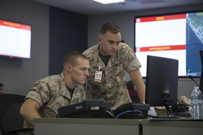 U.S. Marine Corps 1st Lt. Kyle Randow (left), a Military Police Officer with Security and Emergency Services Battalion (SES Bn), Marine Corps Installations West (MCIWEST), Marine Corps Base (MCB), Camp Pendleton and 1st Lt. Bradley Worthan, a Military Police Officer, with SES Bn, MCIWEST-MCB, Camp Pendleton, participate in Exercise Vigilant Shield 2017 (VS-17) on Camp Pendleton, Calif., Oct. 18, 2016. Exercise VS-17 is a US Northern Command command level training event conducted as an Anti-Terrorism/Force Protection Command Post Exercise, and supported by various Field Training Exercises. (U.S. Marine Corps photo by Cpl. Tyler S. Dietrich)