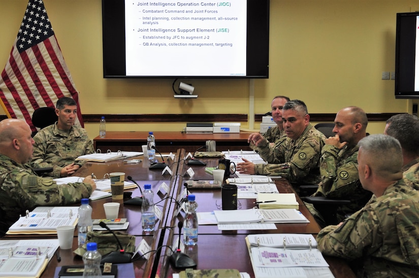 U.S. Army Central key personnel discuss experiences and share ideas during a targeting seminar at Camp Arifjan, Kuwait Oct. 12, 2016. The open forum seminar allowed key leaders to learn and discuss important strategies and doctrine concerning the concept of joint targeting. (U.S. Army photo by Sgt. Aaron Ellerman)