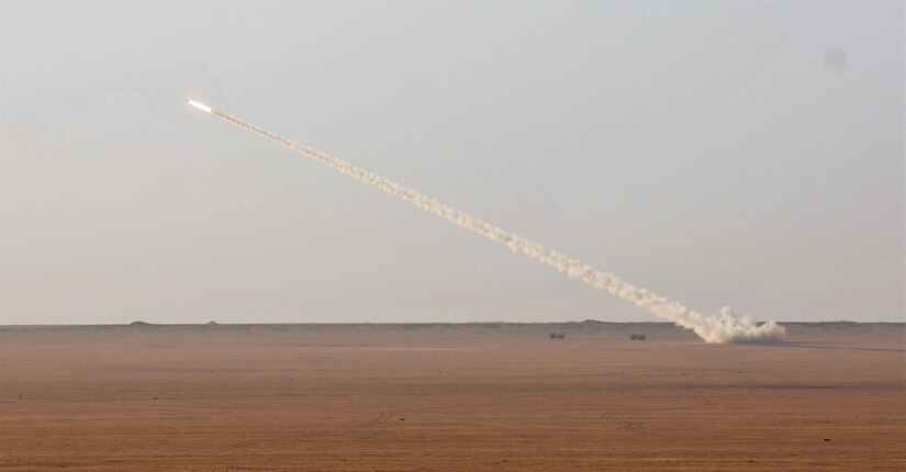 A rocket fired from a M142 high mobility rocket system sails through the sky during a decisive action training environment exercise on Oct. 4, 2016 near Camp Buehring, Kuwait. The 1st Battalion, 94th Field Artillery Regiment certified four HIMARS operator crews on the M142 High Mobility Rocket System as well as a contingent of forward observers during the exercise. (U.S. Army photo by Sgt. Aaron Ellerman)