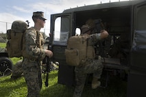 U.S. Marines mount Japan Ground Self-Defense Force tactical vehicles before executing the patrolling portion of the annual Guard and Protect, an observe and exchange event, Oct. 6 on Marine Corps Air Station Futenma, Okinawa, Japan. The exchange provided U.S. and JGSDF service members with the opportunity to observe each other’s operation procedures in order to sharpen their defense skill sets and strengthen their bilateral relationship. During the patrolling portion of the exchange, service members formed integrated teams and practiced hand and arm signals and proper methods of patrolling areas with varying terrain features.