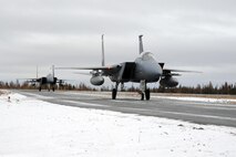 F-15 Eagles from the 142nd Fighter Wing arrive in Yellowknife, Northwest Territories, for Exercise Vigilant Shield 2017, Oct. 17, 2016.  Vigilant Shield 17 represents a unique opportunity to practice and hone joint interoperability and cooperation skills between Canada and the United States in order to protect borders as well as national interests.  (U.S. Air National Guard photo by Senior Master Sgt. Shelly Davison, 142nd Fighter Wing Public Affairs).