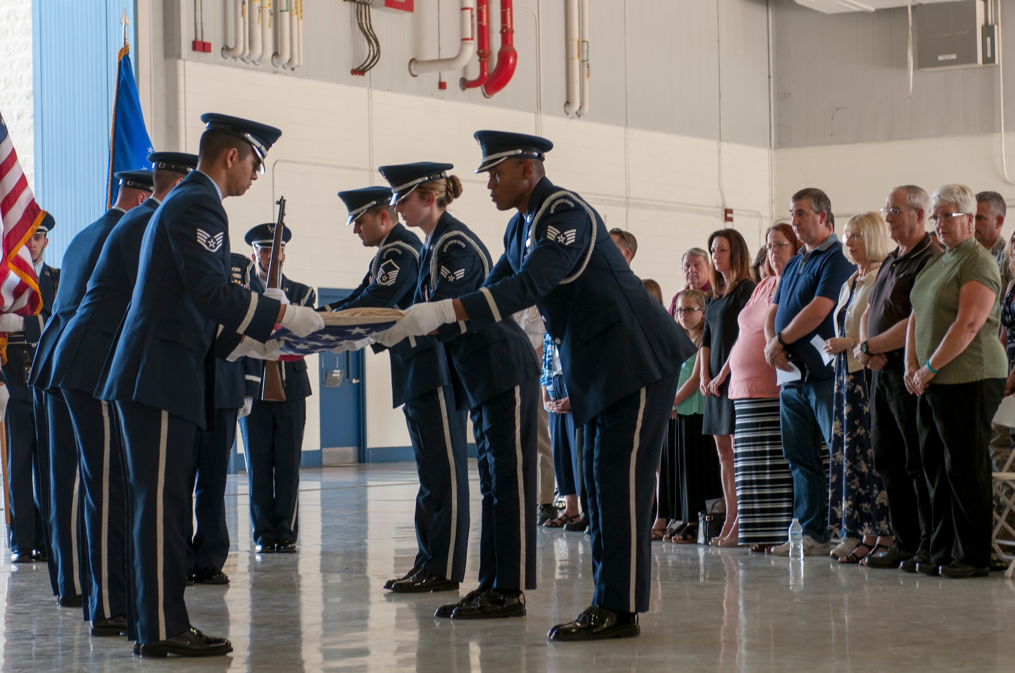 The Arizona Air National Guard’s 162nd Wing honor guard conducts a flag folding ceremony here October 14.  The ceremony honored the life and memory of the unit’s first and longest serving commander, retired Maj. Gen. Donald E. Morris who died June 7, 2016. (U.S. Air National Guard photo by 1st Lt. Lacey Roberts)
