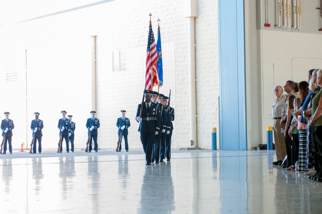 The Arizona Air National Guard’s 162nd Wing and Davis-Monthan Air Force Base honor guard present the colors during a ceremony at Tucson International Airport October 14.  The ceremony honored the life and memory of the unit’s first and longest serving commander retired Maj. Gen. Donald E. Morris who died June 7, 2016. (U.S. Air National Guard photo by 1st Lt. Lacey Roberts)