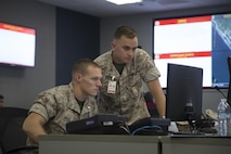 U.S. Marine Corps 1st Lt. Kyle Randow (left), a Military Police Officer with Security and Emergency Services Battalion (SES Bn), Marine Corps Installations West (MCIWEST), Marine Corps Base (MCB), Camp Pendleton and 1st Lt. Bradley Worthan, a Military Police Officer, with SES Bn, MCIWEST-MCB, Camp Pendleton, participate in Exercise Vigilant Shield 2017 (VS-17) on Camp Pendleton, Calif., Oct. 18, 2016. Exercise VS-17 is a US Northern Command command level training event conducted as an Anti-Terrorism/Force Protection Command Post Exercise, and supported by various Field Training Exercises. (U.S. Marine Corps photo by Cpl. Tyler S. Dietrich)