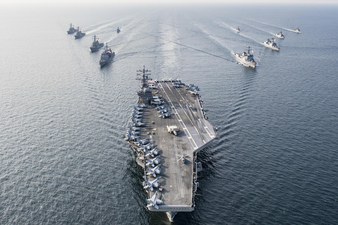 The USS Ronald Reagan steams in formation with ships from Carrier Strike Group 5 and the South Korean navy during Invincible Spirit, a bilateral exercise in the waters off the Korean Peninsula, Oct. 14, 2016. The Reagan is supporting security and stability in the Indo-Asia-Pacific region. Navy photo by Seaman Jamaal Liddell