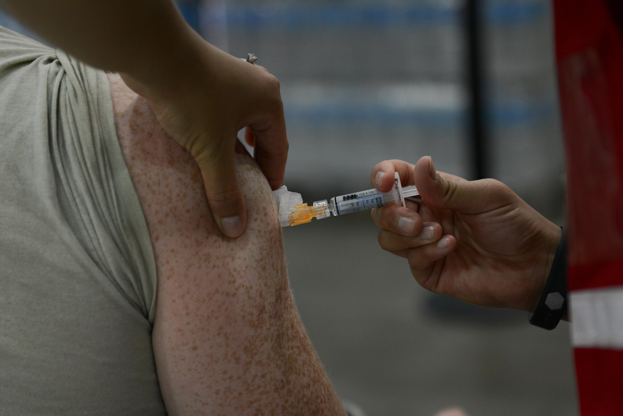 U.S. Air Force Airman 1st Class Alexandria Lovell, 39th Medical Operations Squadron family health technician, administers a flu shot to an Airman Oct. 15, 2016, at Incirlik Air Base, Turkey. The 39th MDOS is responsible for administering influenza vaccinations annually to all military personnel and civilians residing at Incirlik. (U.S. Air Force photo by Senior Airman Jasmonet Jackson)