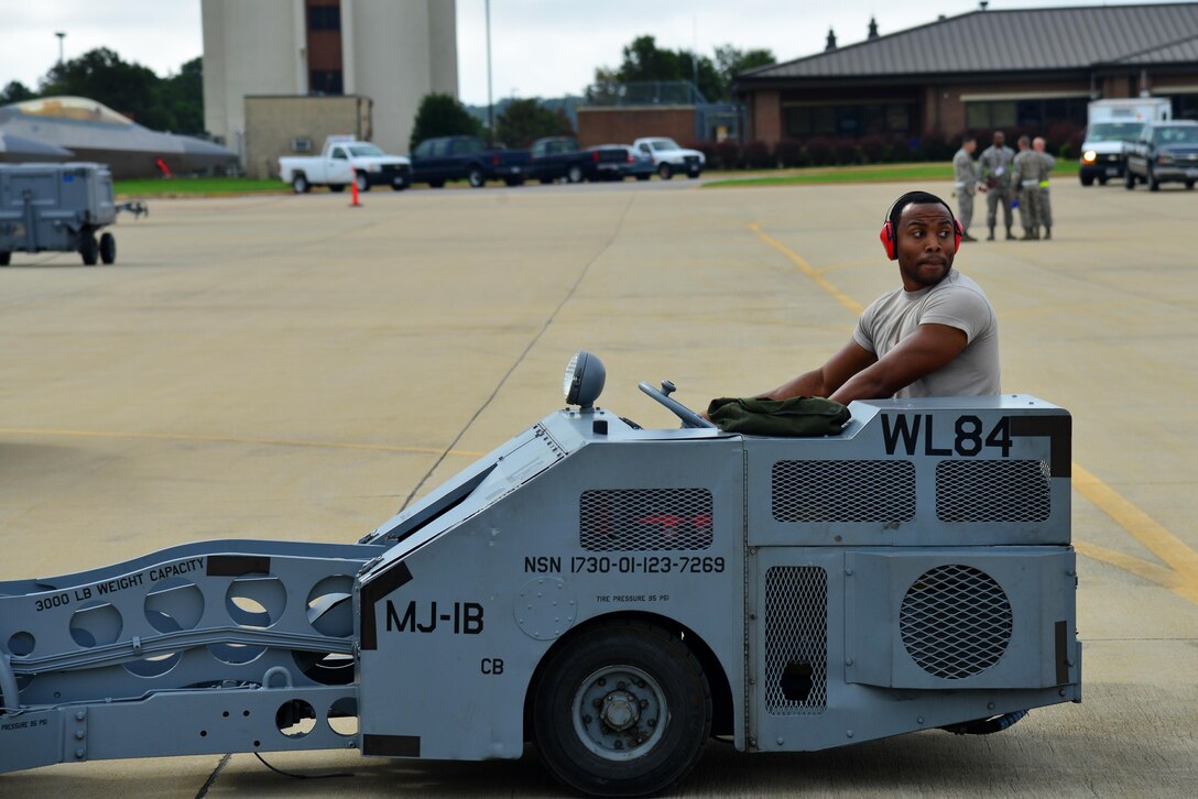 U.S. Air Force Staff Sgt. Pernell Davis, 192nd Aircraft Maintenance Squadron weapons load crew chief, drives a bomb lift while preparing to load ammunition onto an aircraft during an exercise at Joint Base Langley-Eustis, Va., Sept. 30, 2016. The exercise was a five-day long evaluation of Langley Airmen from the 633d Air Base Wing, 1st and 192nd Fighter Wings working together to deploy personnel, equipment and aircraft for contingency operations at a moment's notice. (U.S. Air Force photo by Airman 1st Class Tristan Biese)

