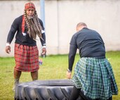 Staff Sgt. Victor Hayes, 450th Intelligence Squadron, waits to compete in a tire flip competition during the 693rd Intelligence, Surveillance and Reconnaissance Group’s 5th Annual Highland Games in Wiesbaden, Germany, Oct 14, 2016. Modeled after the Scottish Highland Games, the 693rd ISRG’s games tested the strength and endurance of competitors as they took a break from work to build camaraderie and morale. (U.S. Air Force photo by Staff Sgt. Timothy Moore)