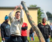 Airman 1st Class Cesar Alcocer, 450th Intelligence Squadron, throws a log during a caber toss competition during the 693rd Intelligence, Surveillance and Reconnaissance Group’s 5th Annual Highland Games in Wiesbaden, Germany, Oct. 14, 2016. Modeled after the Scottish Highland Games, the 693rd ISRG’s games tested the strength and endurance of competitors as they took a break from work to build camaraderie and morale. (U.S. Air Force photo by Staff Sgt. Timothy Moore)