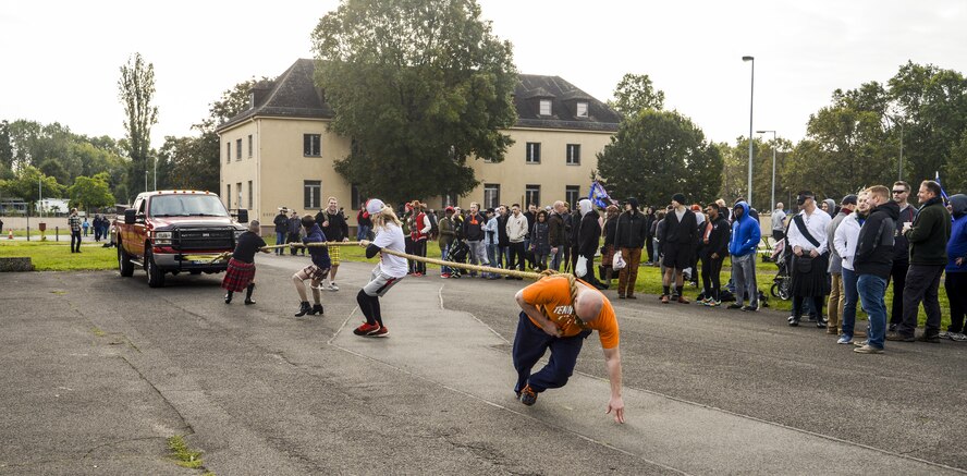 Airmen assigned to the 450th Intelligence Squadron compete in a truck pull contest during the 693rd Intelligence, Surveillance and Reconnaissance Group’s 5th Annual Highland Games in Wiesbaden, Germany, Oct. 14, 2016. Each squadron under the 693rd ISRG had a commander’s team, which consisted of a junior grade Airman, NCO, senior NCO and officer, compete during the games for bragging rights and a trophy. (U.S. Air Force photo by Staff Sgt. Timothy Moore)