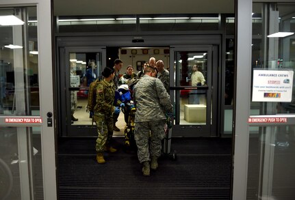 Members of the 59th Medical Wing Acute Lung Rescue Team transport a patient inside the San Antonio Military Medical Center at nearby Joint Base San Antonio-Fort Sam Houston, Texas, Oct. 15, 2016. The 59th MDW’s Acute Lung Rescue Team is comprised of medics with extensive training of aeromedical evacuation techniques. The team’s mission is to ensure patients are safely transported to a higher echelon of medical care. (U.S. Air Force photo/Staff Sgt. Jerilyn Quintanilla)