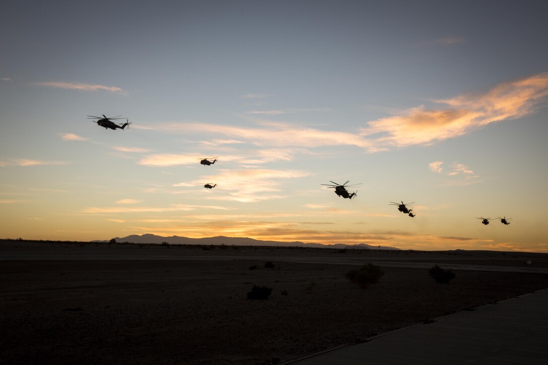 U.S. Marine Corps CH-53E Super Stallions assigned to Marine Aviation Weapons and Tactics Squadron One prepare to land during FINEX 1 in support of Weapons and Tactics Instructor course 1-17 at SELF, Marine Corps Air Ground Combat Center Twentynine Palms, Calif., Oct. 18, 2016. FINEX 1 was part of WTI 1-17, a seven-week training event, hosted by MAWTS-1 cadre which emphasizes operational integration of the six functions of Marine Corps aviation in support of a Marine Air Ground Task Force. MAWTS-1 provides standardized advanced tactical training and certification of unit instructor qualifications to support Marine Aviation Training and Readiness and assists in developing and employing aviation weapons and tactics.