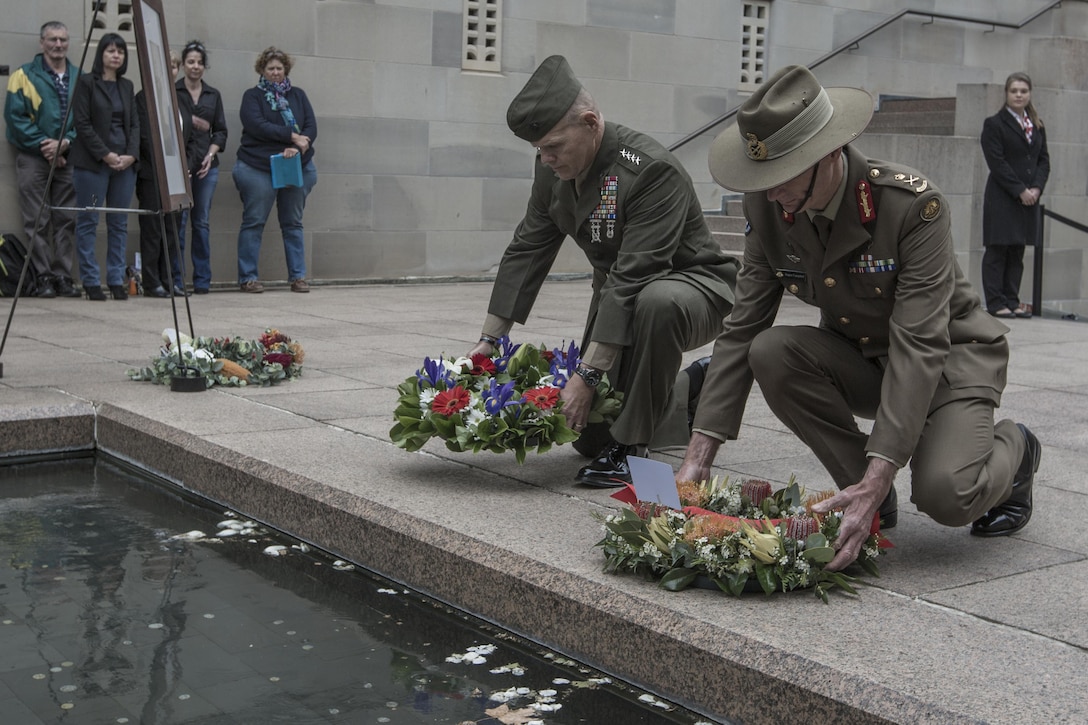 Commandant of the Marine Corps Gen. Robert B. Neller, left, and Australian Army Lt. Gen. Angus Campbell, chief of Army, place wreaths at the  Australian War Memorial, Canberra, Australia, Oct. 18, 2016. Neller and Campbell placed wreaths at the memorial in honor of a fallen World War I Australian Army soldier.