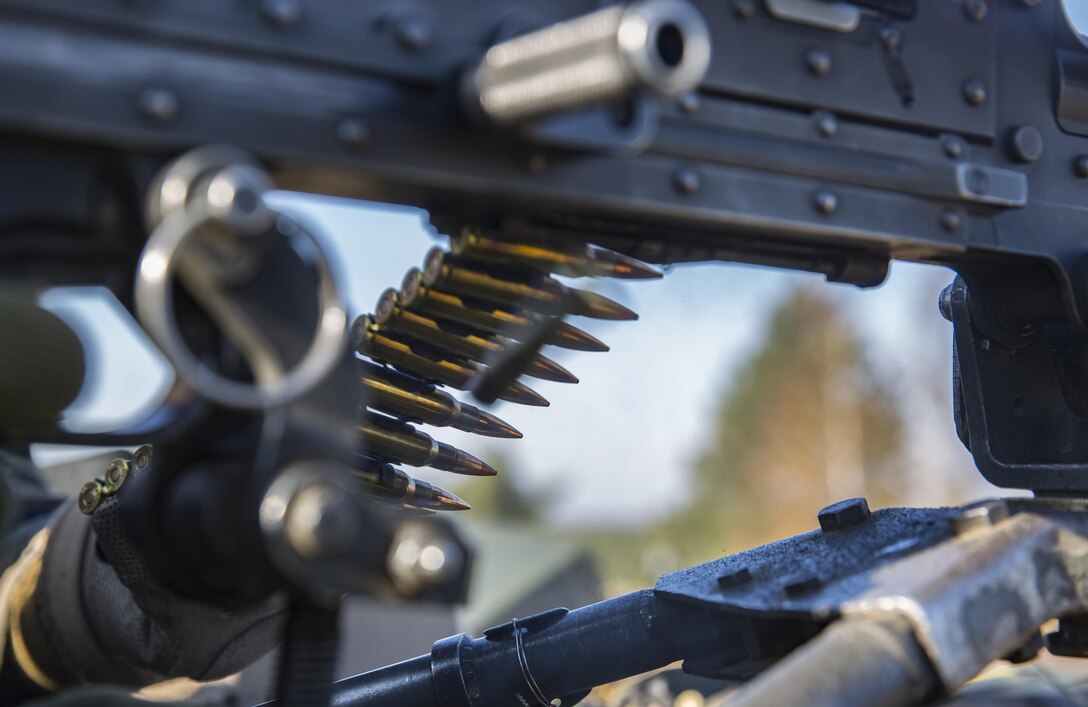 A U.S. Marine with the Black Sea Rotational Force finishes firing a belt of ammunition during live fire squad attack training within exercise Silver Arrow in the Adazi Training Area, Latvia, Oct. 18th, 2016. Silver Arrow allows Marines to train alongside forces from Romania, Latvia, Lithuania, Albania, Estonia, Germany and the United Kingdom to enhance participants’ collective professional military capacity, promote regional stability and build enduring relationships with partner nations.