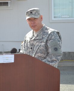 Lt. Col. Thomas J. Harzewski, who is addressing his new command, a Rio Rancho, New Mexico resident, assumed command of the 483rd Terminal Battalion from Lt. Col. Kevin O. McKenzie at the Military Ocean Terminal Concord, October 15. Col. Toni A. Glover, 650th Regional Support Group commander, located in Las Vegas, Nevada, was present to transfer the unit colors to Harzewski from McKenzie, who has led the unit for two years.