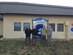 From left to right, Staff Sgt. Joseph Lopez, 36th Rescue Squadron flight engineer, Tech. Sgt. Amber Schumacher, 336th Training Support Squadron independent medical technician, Capt. Erik Greendyke, 36th RQS operations officer, and Capt. John Harris, 336th Training Group executive officer, pose with the 36th RQS squadron sign. It is squadron tradition to change the number on the sign signifying the amount of people saved by the 36th RQS. This rescue marks the 692nd save the 36th RQS has accomplished. (Courtesy photo)