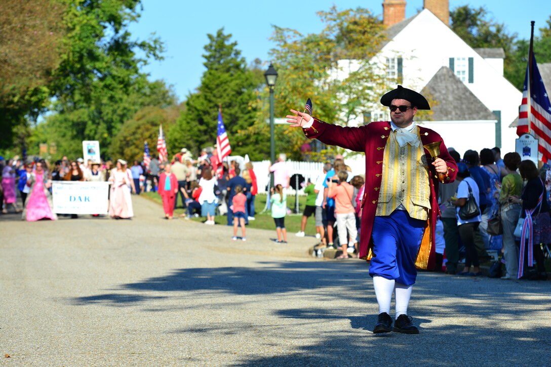 Walt Lathan, Yorktown crier, welcomes everyone to Yorktown Va., during the Yorktown Day parade, Oct. 19, 2016. The modern Yorktown Day observance started in 1922, when the Daughters of the American Revolution began an annual wreath-laying ceremony, which set the tradition for the current observances. (U.S. Air Force photo by Airman 1st Class Tristan Biese)