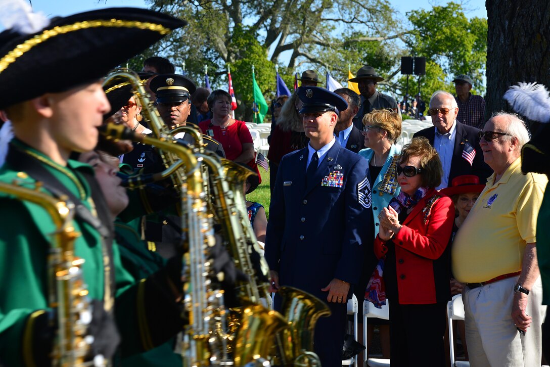 U.S. Air Force Chief Master Sgt. Kennon Arnold, 633rd Air Base Wing command chief, joins locals as they celebrate at the Yorktown day parade in Yorktown Va., Oct. 19, 2016. Yorktown Day celebrates the Battle of Yorktown, the last major land battle of the American Revolutionary War, which ended with British General Lord Charles Cornwallis’ surrender to American and French forces led by General George Washington and Jean-Baptiste Donatien de Vimeur, the Comte de Rochambeau. (U.S. Air Force photo by Airman 1st Class Tristan Biese)