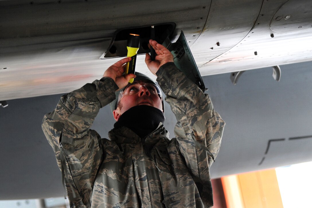 Air Force Staff Sgt. James Whittle performs inspections on F-15 Eagles following their arrival in Yellowknife, Canada, to participate in Exercise Vigilant Shield 2017, Oct. 17, 2016. Whittle is assigned to the Oregon Air National Guard’s 142nd Maintenance Group. Air National Guard photo by Senior Master Sgt. Shelly Davison