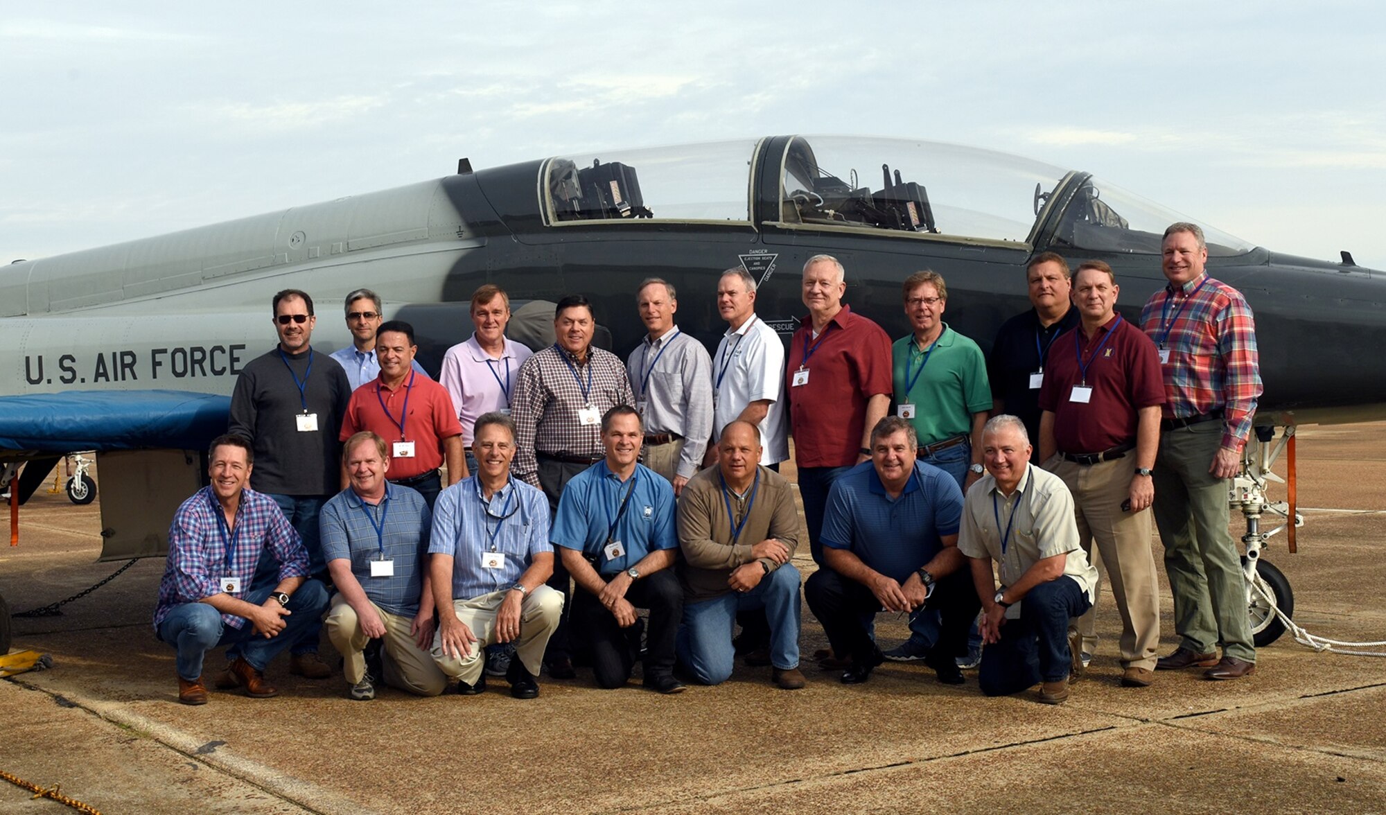 Members from Undergraduate Pilot Training Class 84-01 pause for a group photo next to a T-38 Talon Oct. 14 at Columbus Air Force Base, Mississippi. (U.S. Air Force photo by Melissa Doublin)