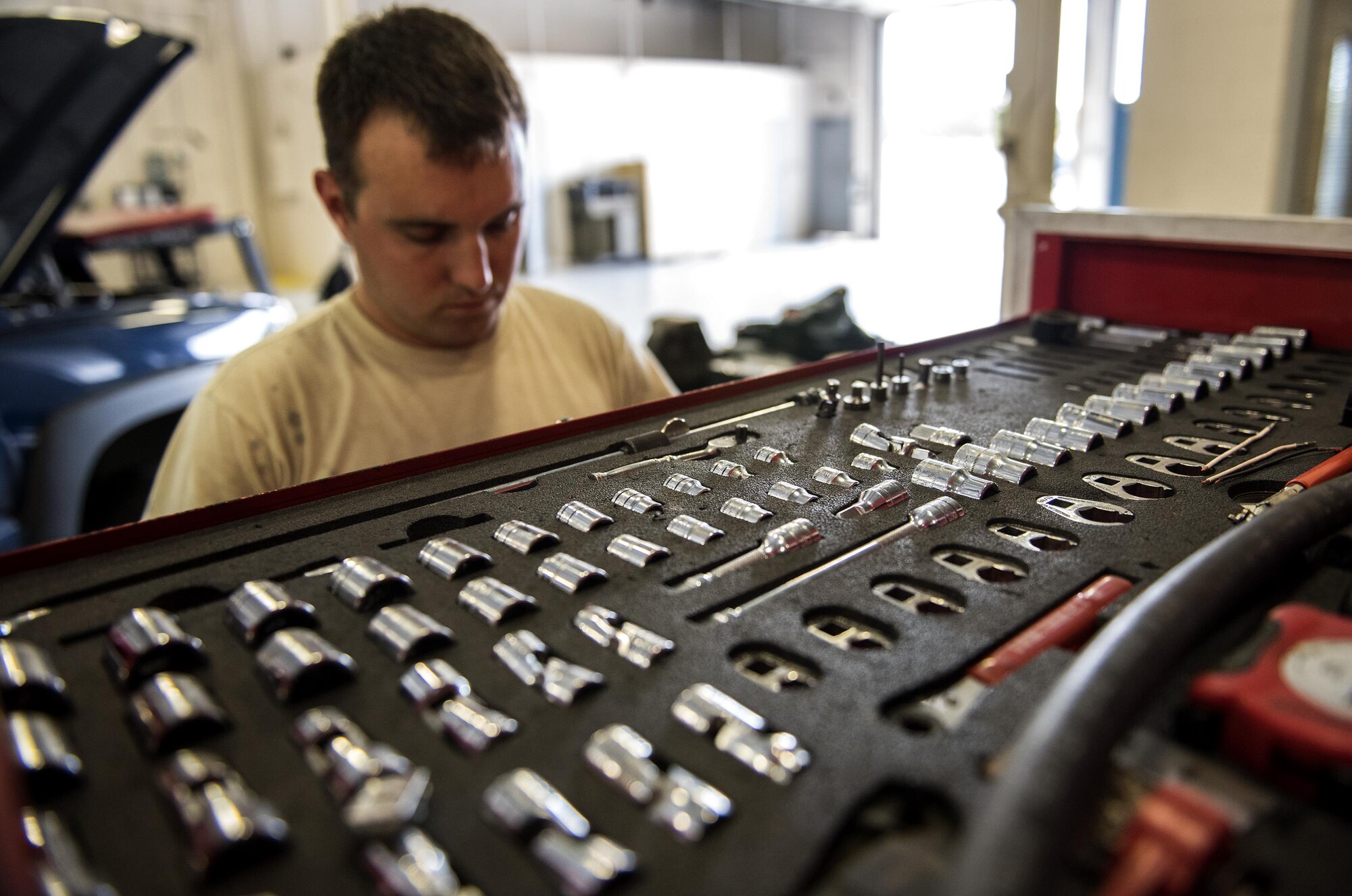 Staff Sgt. Adam Hix, 23d Logistics Readiness Squadron vehicle maintenance technician, puts away tools, Oct. 12, 2016, at Moody Air Force Base, Ga. At the end of the day, technicians ensure they put all tools back in their designated drawer to maintain accountability. (U.S. Air Force photo by Airman 1st Class Janiqua P. Robinson)