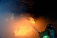 Firefighters assigned to the 99th Civil Engineer Squadron Fire Protection Flight, extinguish a controlled fire during a training exercise Sept. 23, 2016, at Creech Air Force Base, Nev. During the burn, the firefighters were accompanied by three distinguished visitors. (U.S. Air Force photo by Airman 1st Class James Thompson) 
