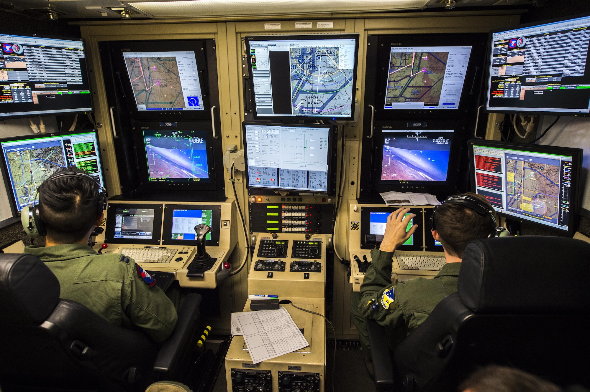 A student pilot and sensor operator fly on a training mission Oct. 5 at Holloman Air Force Base, N.M. Sensor operator students go through three to four months of Initial Qualification Training, where they go through phases of instruction that directly prepare them for the operational environment. (U.S. Air Force photo by Senior Airman Emily Kenney) 