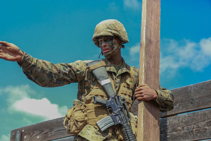 Private Edgar F. Amaya, Echo Company, 2nd Recruit Training Battalion, traverses an obstacle during the Crucible at Marine Corps Base Camp Pendleton, Calif. Following recruit training, Amaya will report to the School of Infantry at Camp Pendleton, Calif., and then to his military occupation specialty school to become an air traffic controller.