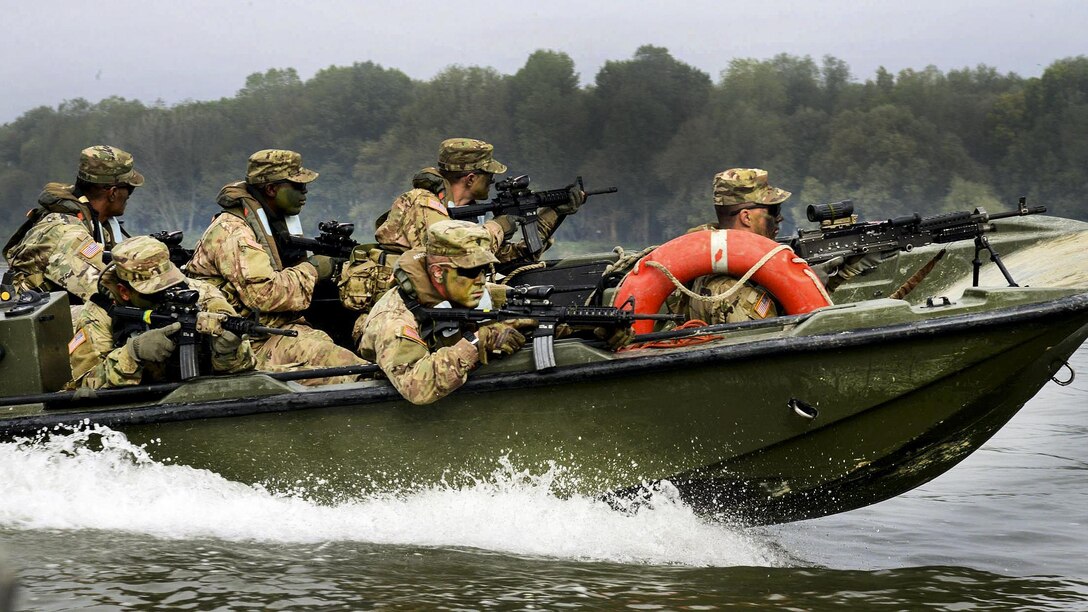<strong>Photo of the Day: Oct. 21, 2016</strong><br/><br />Paratroopers provide security from a high-speed patrol boat while advancing toward their next objective during Livorno Shock, an exercise in Piacenza, Italy, Oct. 17, 2016. Army photo by Massimo Bovo<br/><br /><a href="http://www.defense.gov/Media/Photo-Gallery?igcategory=Photo%20of%20the%20Day"> Click here to see more Photos of the Day. </a>