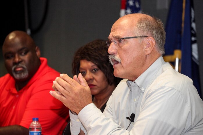 Panelist Will White (right) tells his story during Huntsville Center’s National Disability Employment Awareness Month program Oct. 20 as fellow panelists Pam Fuqua and Arthur Martin III look on. As a 19 year old soldier serving in Vietnam, White lost his leg to a bomb during an attack on his base there in 1970. White said he never let it interfere with his ability to move forward in his life and his career. 