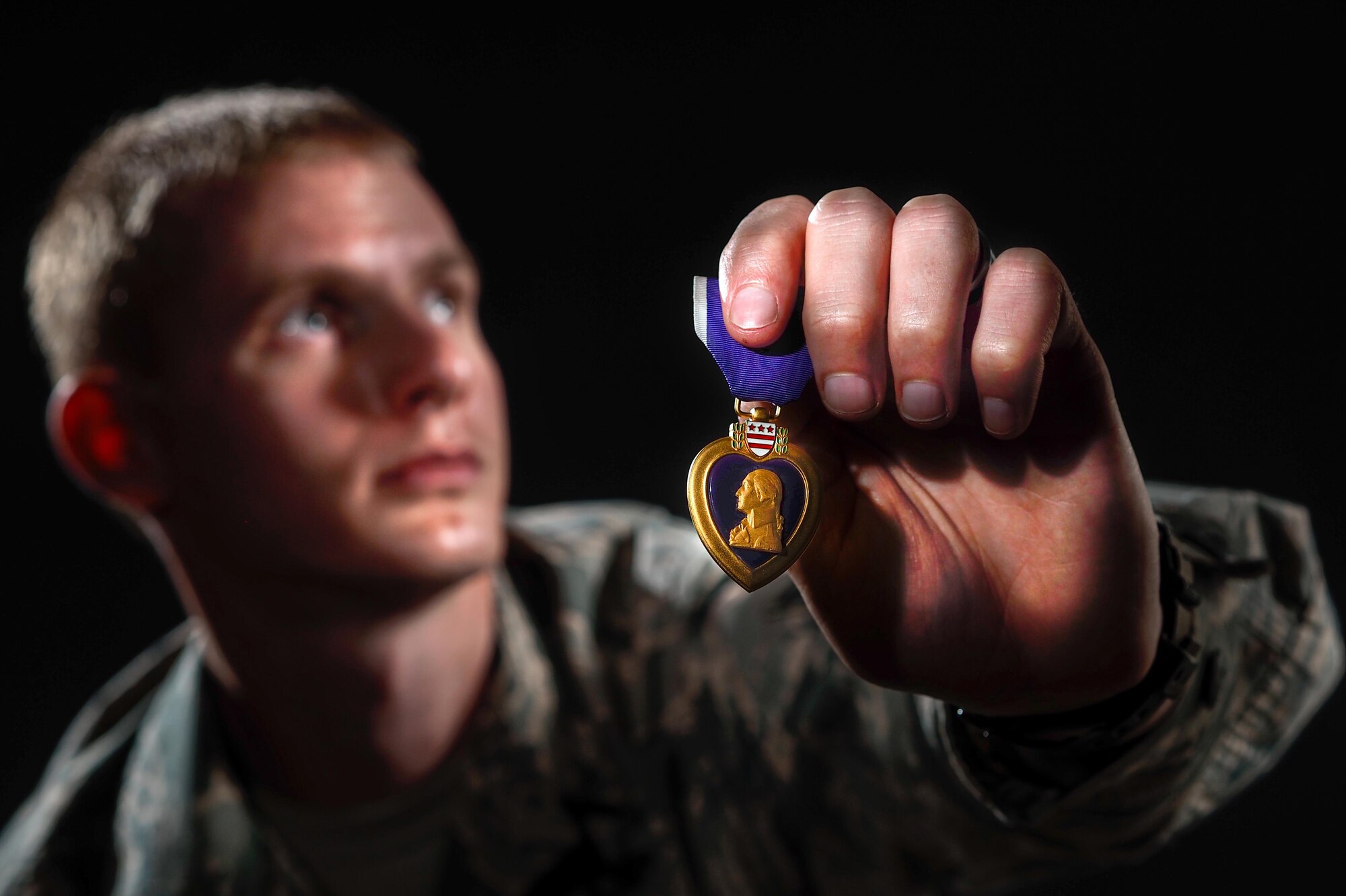 Air Force Staff Sgt. Christopher Wiedmer, a vehicle operator assigned to the 773d Logistics Readiness Squadron at Joint Base Elmendorf-Richardson, Alaska, poses for a portrait, Wednesday, Oct. 5, 2016.  Wiedmer received the Purple Heart after he was wounded by an improvised explosive device, and suffered a traumatic brain injury and severe burns, in Iraq during his 2011 deployment in support of Operation New Dawn while serving as a lead vehicle commander with the 424th Medium Truck Detachment. Wiedmer stresses how important resiliency was to his recovery, and finds fulfillment in mentoring young Airmen saying he strives to live up to the noncommissioned officer standards he was shown as a junior Airman. 