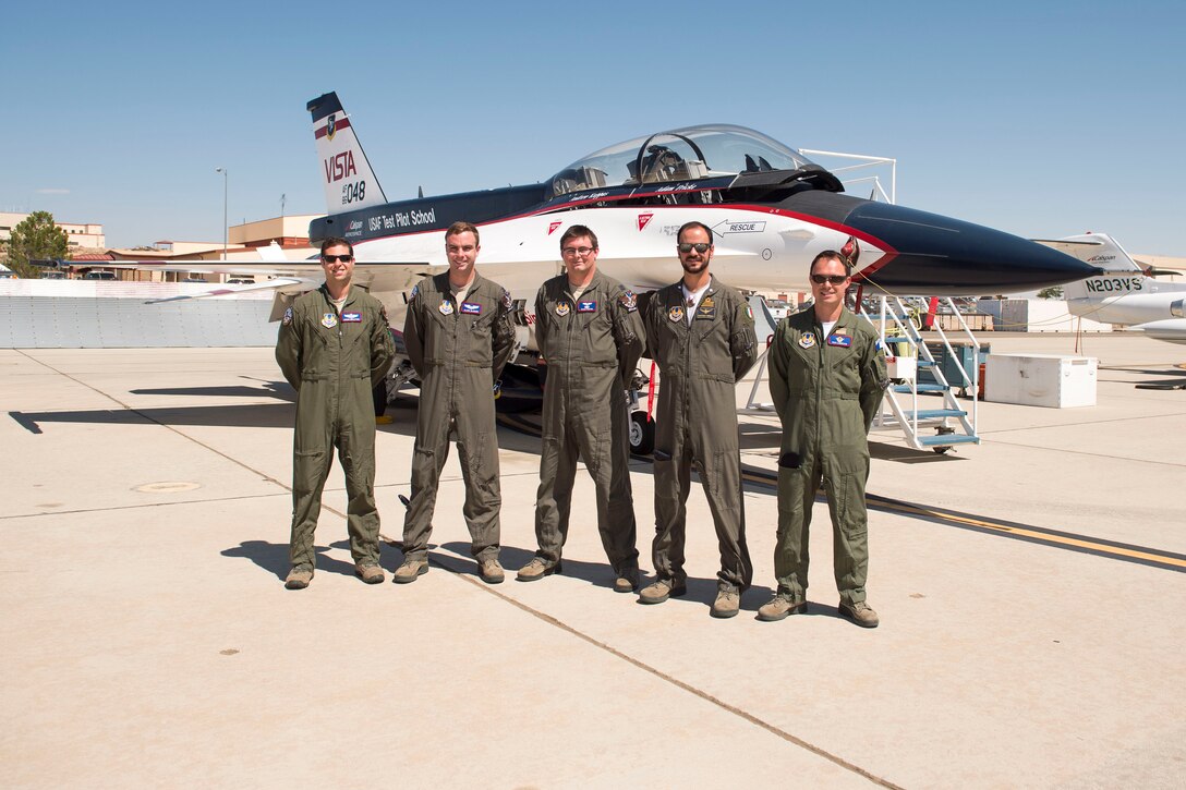 U.S. Air Force Test Pilot School students with Class 16A -- Capt. Daniel Edelstein, Capt. Clark McGehee, Capt Craig Porter, Italian Air Force Capt. Raffaele Odesco, and French Air Force Maj. Nicolas Langevin – tested the L1 Adaptive Contol System recently using the F-16 Variable In-flight Stability Test Aircraft, or VISTA. (Courtesy photo)