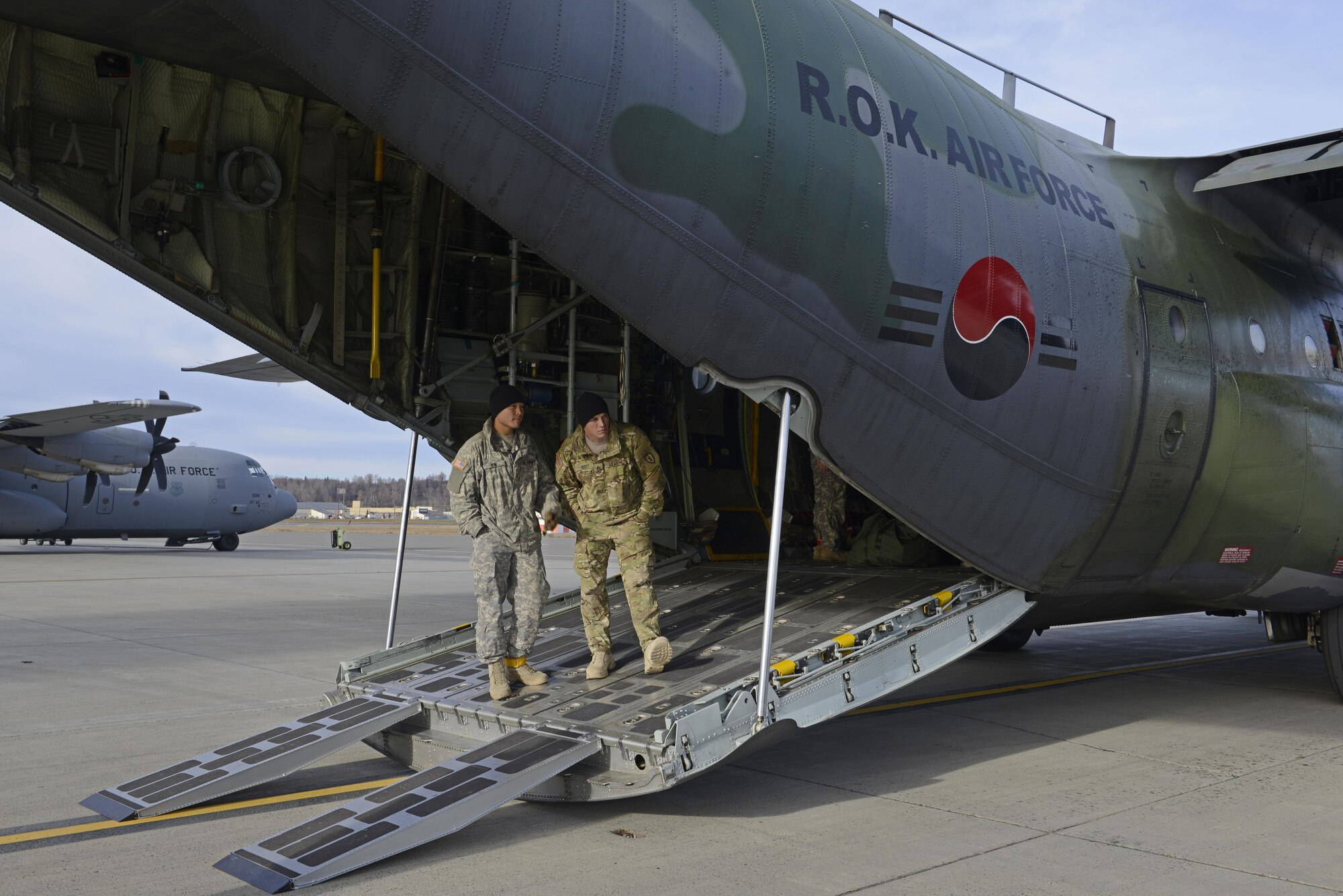 Soldiers with the 4th Infantry Brigade Combat Team (Airborne), 25th Infantry Division, U.S. Army Alaska, wait for paratroopers to board a Republic of Korea Air Force C-130 Hercules during Red Flag Alaska 17-1 at Joint Base Elmendorf-Richardson, Alaska, Oct. 19, 2016. Red Flag-Alaska exercises are focused on improving the combat readiness of U.S. and international forces and providing training for units preparing for Air Expeditionary Force taskings.