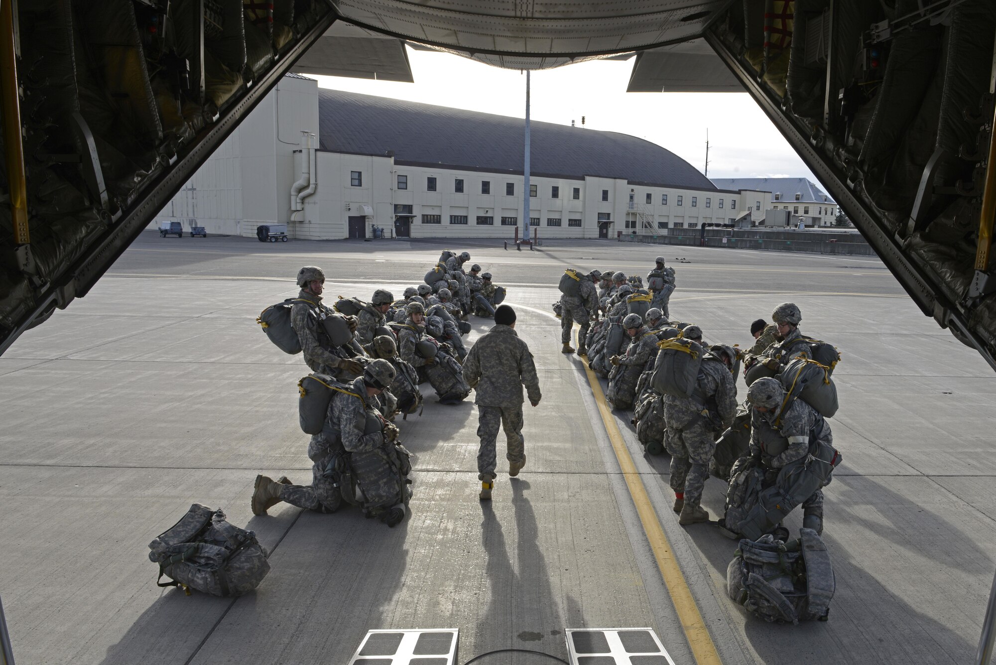 Paratroopers with the 4th Infantry Brigade Combat Team (Airborne), 25th Infantry Division, U.S. Army Alaska, prepare to board a Republic of Korea Air Force C-130 Hercules during Red Flag Alaska 17-1 at Joint Base Elmendorf-Richardson, Alaska, Oct. 19, 2016. Red Flag-Alaska exercises are focused on improving the combat readiness of U.S. and international forces and providing training for units preparing for Air Expeditionary Force taskings. 