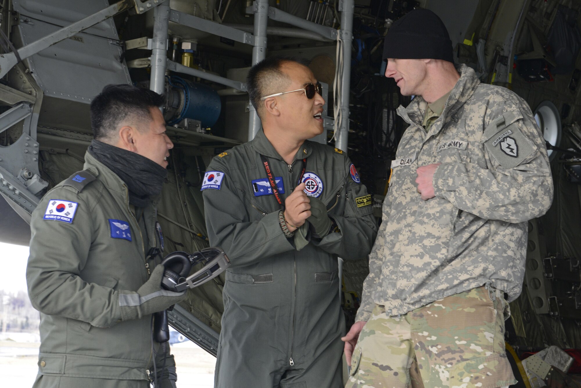 Airmen from the Republic of Korea Air Force speak with Soldiers from the 4th Infantry Brigade Combat Team (Airborne), 25th Infantry Division, U.S. Army Alaska, to prepare for a jump during Red Flag Alaska 17-1 at Joint Base Elmendorf-Richardson, Alaska, Oct. 19, 2016. Red-Flag Alaska 17-1 provides joint offensive counter-air, interdiction, close air support, and large force employment training in a simulated combat environment.
